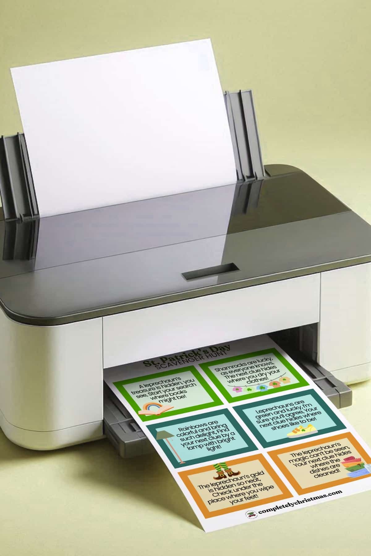 Image of a printer, printing out the cards to the St. Patrick's Day Scavenger Hunt.